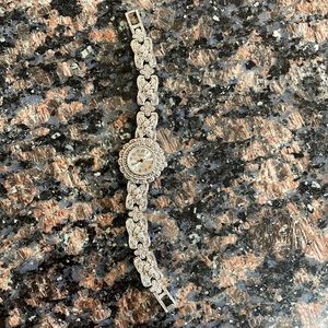 Milan Quartz, stainless steel back watch, made in Japan